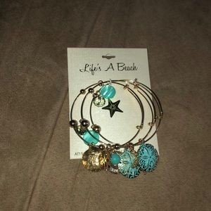 Brand new gold and turquoise bangles